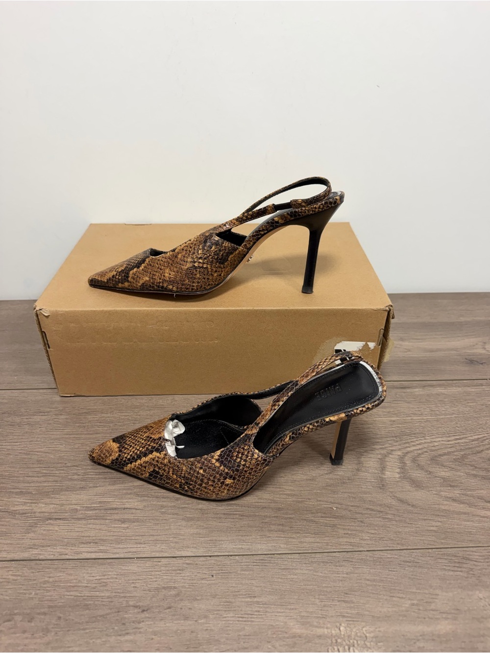 Used PAIGE Sienna Pump in
the Chestnut snake-embossed print. Size 7